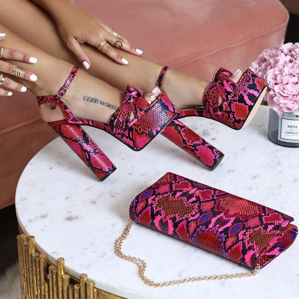 Pink snake skin platform heels and matching clutch